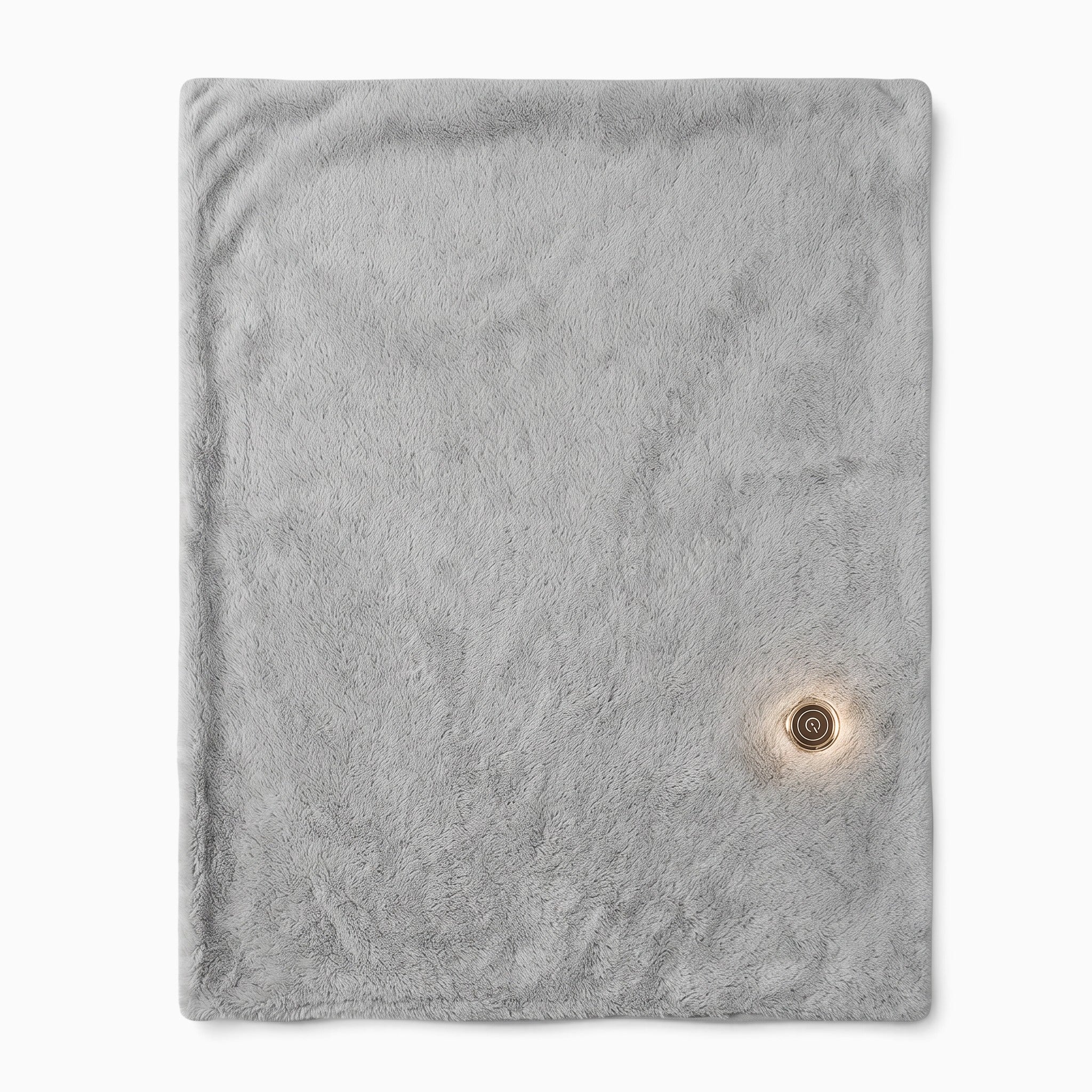 Plaid chauffant gris UnPeignoir en matière douce avec bouton de réglage lumineux pour trois niveaux de température
